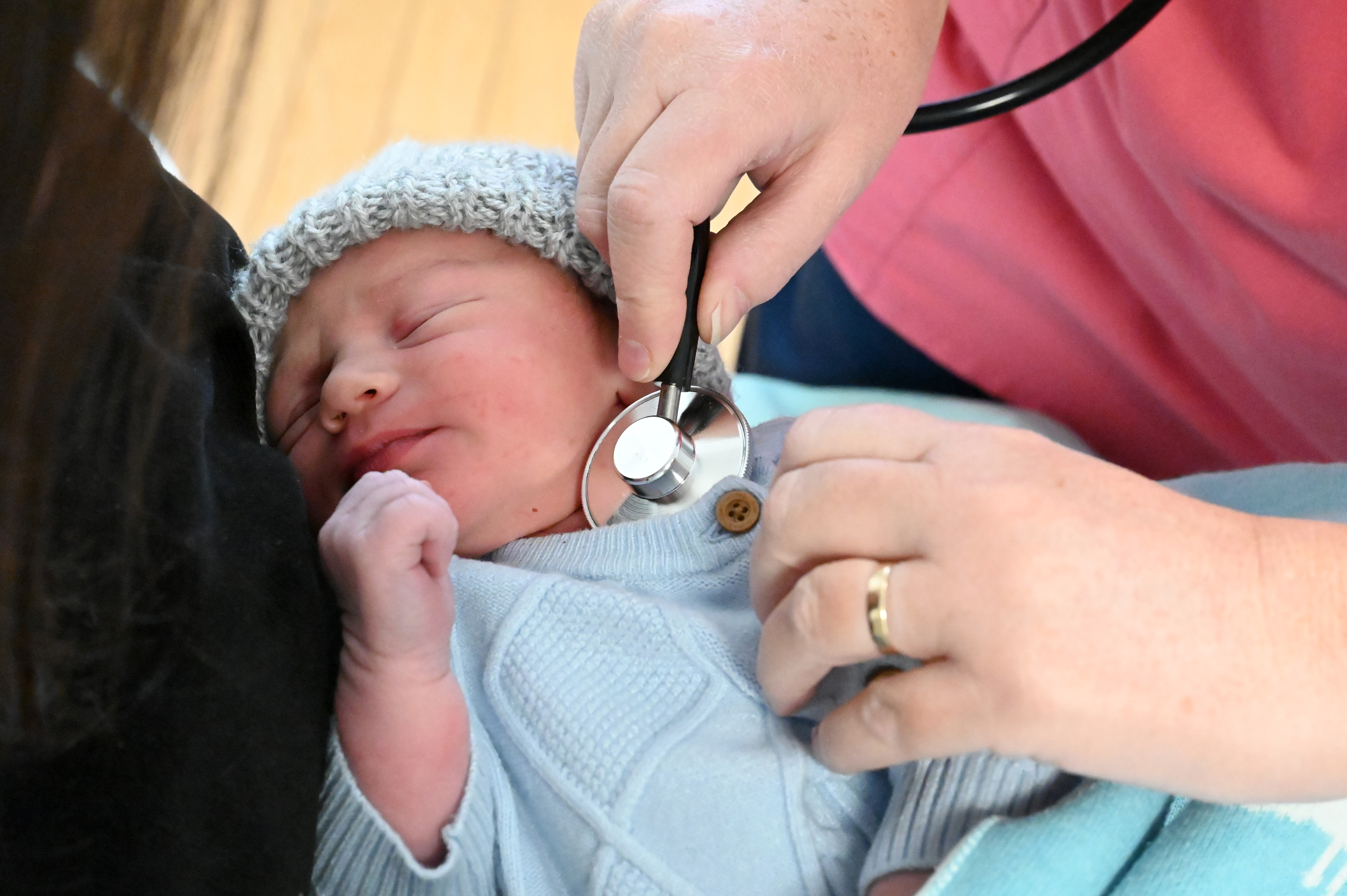 Image courtesy of Calderdale & Huddersfield NHS Trust of a baby being examined with a stethoscope